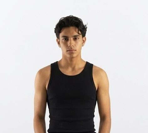 premium twinfish model wearing premium black ribbed tank top